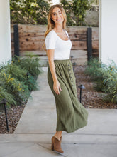 The Reed Pleated Midi in Olive