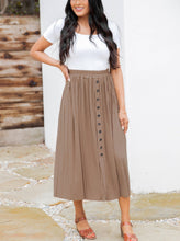 The Reed Pleated Midi in Black